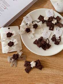 2 件装棕色巧克力花心镂空蝴蝶结针织发带马尾辫夹，适合儿童，秋冬季 - 花朵愛心鏤空蝴蝶結髮圈 - 查看 1