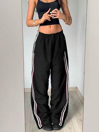 Legere weite Schlupfhose mit taillentiefem Bund und Streifen