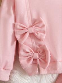 小女孩可爱蝴蝶结点缀粉色套装，采用弹性柔软面料制成，套头衫搭配喇叭裤，甜美而俏皮。粉色色调柔和，适合日常穿着和各种场合，轻松打造活力外观，宝宝衣柜中的百搭单品 - 粉色 - 查看 5