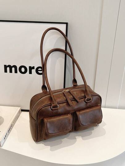 黑色时尚机车风单肩包，多口袋设计，适合工作通勤、街头风和日系风格，女性必备单品。