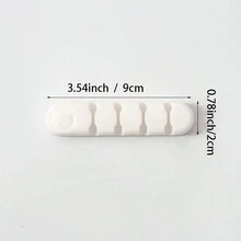 Bộ sắp xếp cáp để bàn hiệu quả cao với 4 lỗ để sạc cáp và đầu nối - Làm bằng chất liệu silicon mềm giúp bàn làm việc của bạn gọn gàng - Nhiều màu - Xem 10