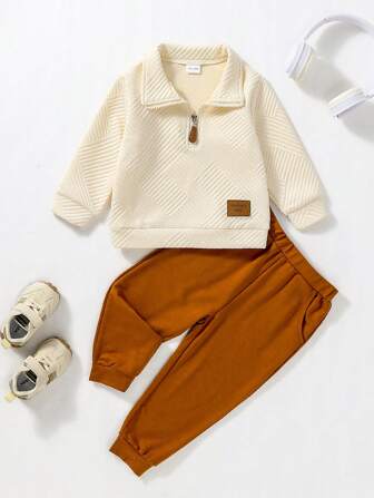 小男孩时尚春秋两件套：半拉链高领长袖上衣和休闲哈伦裤
