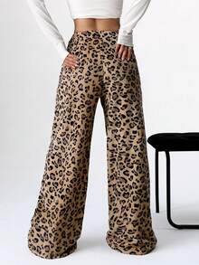 Calça feminina casual de inverno com estampa de leopardo felpuda e cintura elástica, ideal para o outono e inverno. Pernas largas e modelagem solta. Perfeita para usar no outono e inverno.