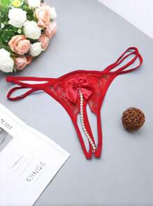 AB. 性感时尚串珠蕾丝蝴蝶结无裆丁字裤