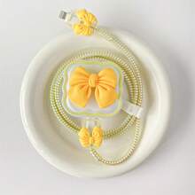 Custodia protettiva per caricabatterie standard britannico da 20 W, in morbida scocca con design a onde e fiocchi per proteggere il cavo compatibile con 16 Pro Max / 15 Pro Max