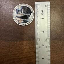 1枚邮轮和冰山设计纪念币收藏，创意新颖