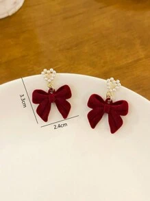 1 paire de boucles d'oreilles à tige avec un design de nœud en forme de cœur en velours et faux perles, nœud noir. Bijou de mode pour cadeau aux femmes, convient pour le Nouvel An, le Printemps, la Saint-Valentin, la Fête des Mères.
