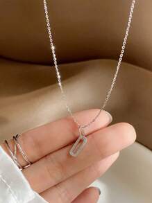1 pezzo Collana con pendente in acciaio inossidabile, design elegante a fermaglio d'oro, semplice pendente ovale aperto, regalo di gioielleria per ragazze