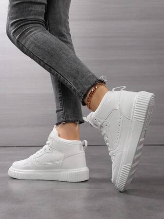 Nya vår/höst mellantopp vita mångsidiga canvasskor för kvinnor, fritidssportskor, fashionabla och multifunktionella sneakers, skateskor