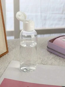 洗发水和沐浴露旅行瓶带翻盖，防漏，挤压容器，化妆品瓶，可重复使用，家庭必需品，透明 100ml 空分配器容器带翻盖旅行瓶，适合旅行化妆品，翻盖瓶指甲油去除剂酒精液体容器卸妆液可再填充透明化妆品容器学校学校用品假日露营假日必需品度假配件迷你女士香水男士香水海滩 - 無色 - 查看 2