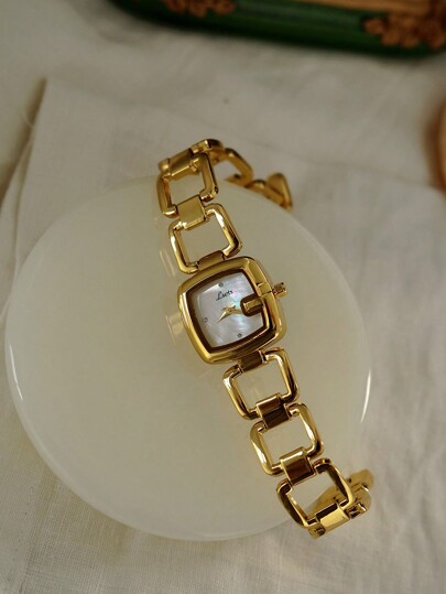 1pc Women's Elegant High-End Fashion Luxury Quartz Watch, Silver Color, Stainless Steel Band, Rhinestone & Mother Of Pearl Dial, Hollow Design, Retro Chic Style, Waterproof, Suitable For Casual, Party And Gift Giving