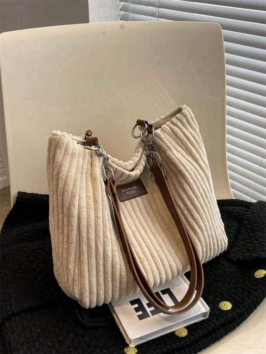 轻便时尚，大容量，简约风格的毛绒单肩手提包，适合上学、旅行、购物、约会等场合，是送给年轻女孩、大学生、年轻职业人士和上班族的理想礼物。也适合办公室、大学、工作、商务、通勤、户外活动、旅行、野餐等场合，可用作背包。