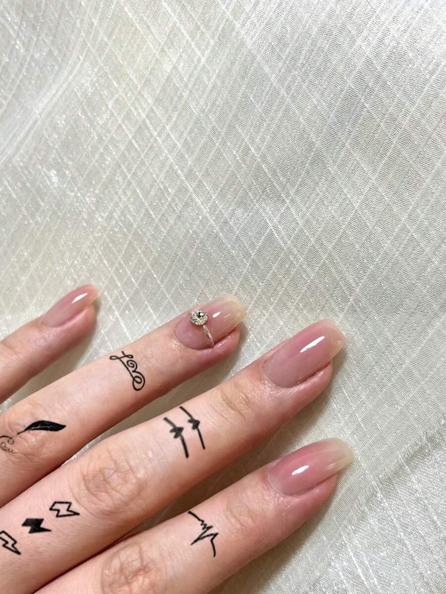 Sheet Of Temporary Tattoos With Designs Of Black Butterfly, Diamond