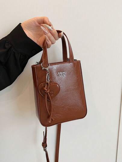 1 件女式纯色 PU 皮革拉链开合手提包，适合约会和礼物