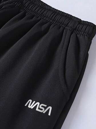 男士毛绒保暖内衬印花休闲慢跑裤，腰部有抽绳，适合秋冬穿着