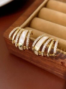 1 par de pendientes geométricos con forma de garra con diamantes microincustrados brillantes, pendientes elegantes para mujeres