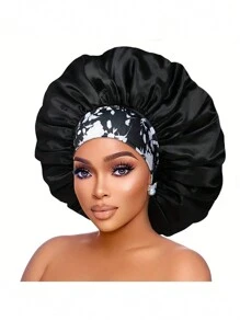 Un ampio cappello da notte con fascia elastica stampata, adatto per capelli ricci o lisci, per le signore