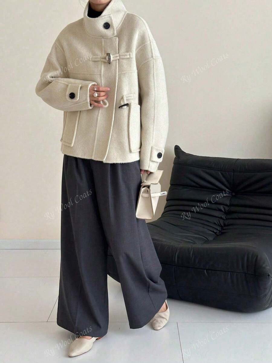 Abrigo femenino nuevo de estilo chino de doble cara - unicolor, cuello vuelto. Perfecto para otoño y primavera.