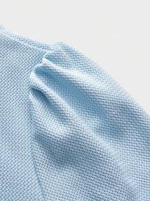 Camisa de mujer de punto de unicolor con lazo en escote en V, manga abullonada, estilo casual y versátil para la oficina o para usar en primavera y verano