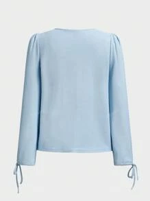 Camisa de mujer de punto de unicolor con lazo en escote en V, manga abullonada, estilo casual y versátil para la oficina o para usar en primavera y verano