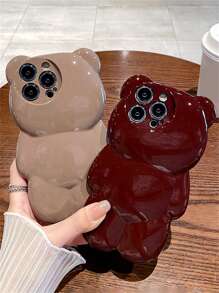 Custodia per telefono divertente a forma di orsetto di peluche con mela, custodia per telefono glitterata 3D a forma di orsetto carina, compatibile con 15 14 13 12 11 Pro Max, cover morbida in silicone con animale antishock e di stile - Castano - Visualizzare 3