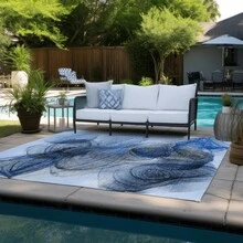 5' X 8' Ivory Blue And Gray Abstract Washable Non Skid Indoor Outdoor Area Rug