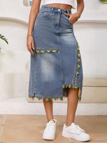 Gonna di jeans lavata asimmetrica elegante e alla moda con frange per donne