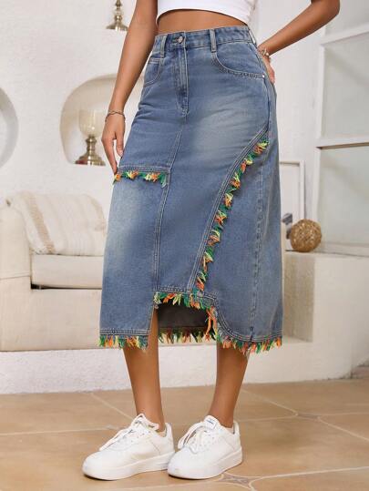 Jupe en jean lavé asymétrique élégante et à la mode avec franges pour femmes