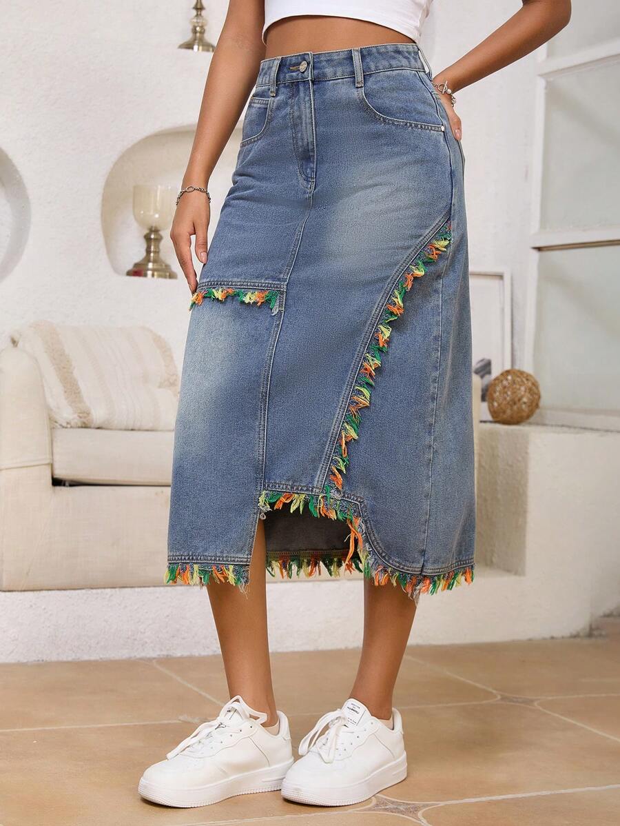 Gonna di jeans lavata asimmetrica elegante e alla moda con frange per donne