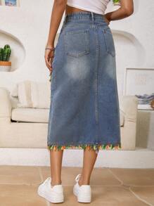 Gonna di jeans lavata asimmetrica elegante e alla moda con frange per donne