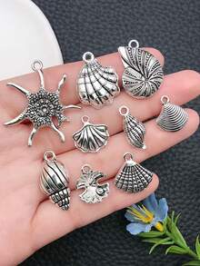 16 chiếc phụ kiện hợp kim Sea Life Series Shell Conch Mặt dây chuyền DIY Vòng tay Vòng cổ Hoa tai Mặt dây chuyền Phong cách Ngẫu nhiên - Màu Bạc Cổ - Xem 2
