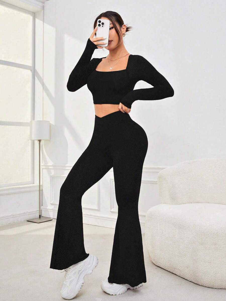 Women's Solid Color Long Sleeved Top And Flared Pants Sportswear Set - Black - View 1