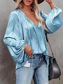 Camicetta minimal con maniche lunghe e laccio sul davanti, di colore unito, casual per uso quotidiano