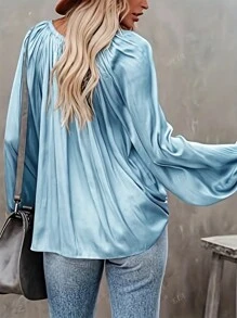 Camicetta minimal con maniche lunghe e laccio sul davanti, di colore unito, casual per uso quotidiano