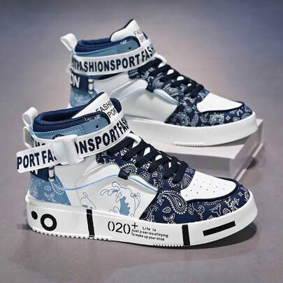 男士时尚休闲运动鞋白色鞋，带有个性化涂鸦印花，适合青少年男孩