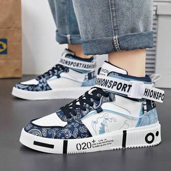 男士时尚休闲运动鞋白色鞋，带有个性化涂鸦印花，适合青少年男孩