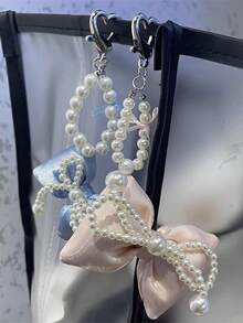 芭蕾风格珍珠蝴蝶结手机支架、钥匙扣、简约包包和耳机装饰，配有蕾丝蝴蝶结和透明垫 - 彩色 - 查看 6