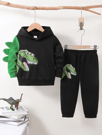 Set de 2 piezas para niños niños con estampado de dinosaurio, que incluye sudadera con capucha y pantalón de chándal a juego, diseño de manga con bloques de color, cuerno de dinosaurio 3D, apto para otoño/invierno