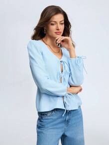 Camisa de mujer de punto de unicolor con lazo en escote en V, manga abullonada, estilo casual y versátil para la oficina o para usar en primavera y verano