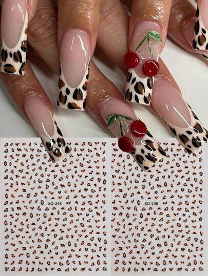 ورقتان من ملصقات الفن المنمر ثلاثي الأبعاد لظفر الخريف والشتاء بنقشة النمر، تصميم فرنسي بطبعات نمري والطلقات الخاصة بحقبة ال- Y2K، تطبيعات ظفر ذات بصمة حيوانية ومواد لوازم الظفر اللاصقة