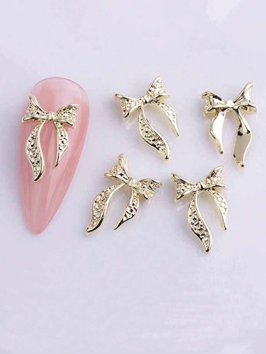 10 chiếc ruy băng hợp kim vàng lấp lánh trang trí móng tay nghệ thuật 3D kim loại sang trọng ruy băng dài nơ dễ thương trang trí móng tay đám cưới tiệc cưới đính hôn trang trí móng tay DIY Kawaii ruy băng vật dụng trang trí móng tay - Vàng - Xem 1