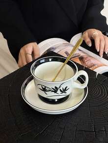 1 Bộ tách cà phê xoáy hoa phong cách cổ điển và đĩa lót - Cốc sứ Latte tinh xảo cao cấp - Hoàn hảo cho nghệ thuật Latte - Đồ uống thanh lịch cho những dịp đặc biệt - Quà tặng sinh nhật lý tưởng cho những người yêu thích cà phê - Đồ dùng trên bàn ăn phong cách và độc đáo cho gia đình và giải trí - màu đen - Xem 4