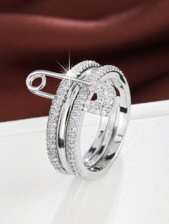 1 pieza Anillo de mujer con diseño de imperdible de moda e incrustado de circonita