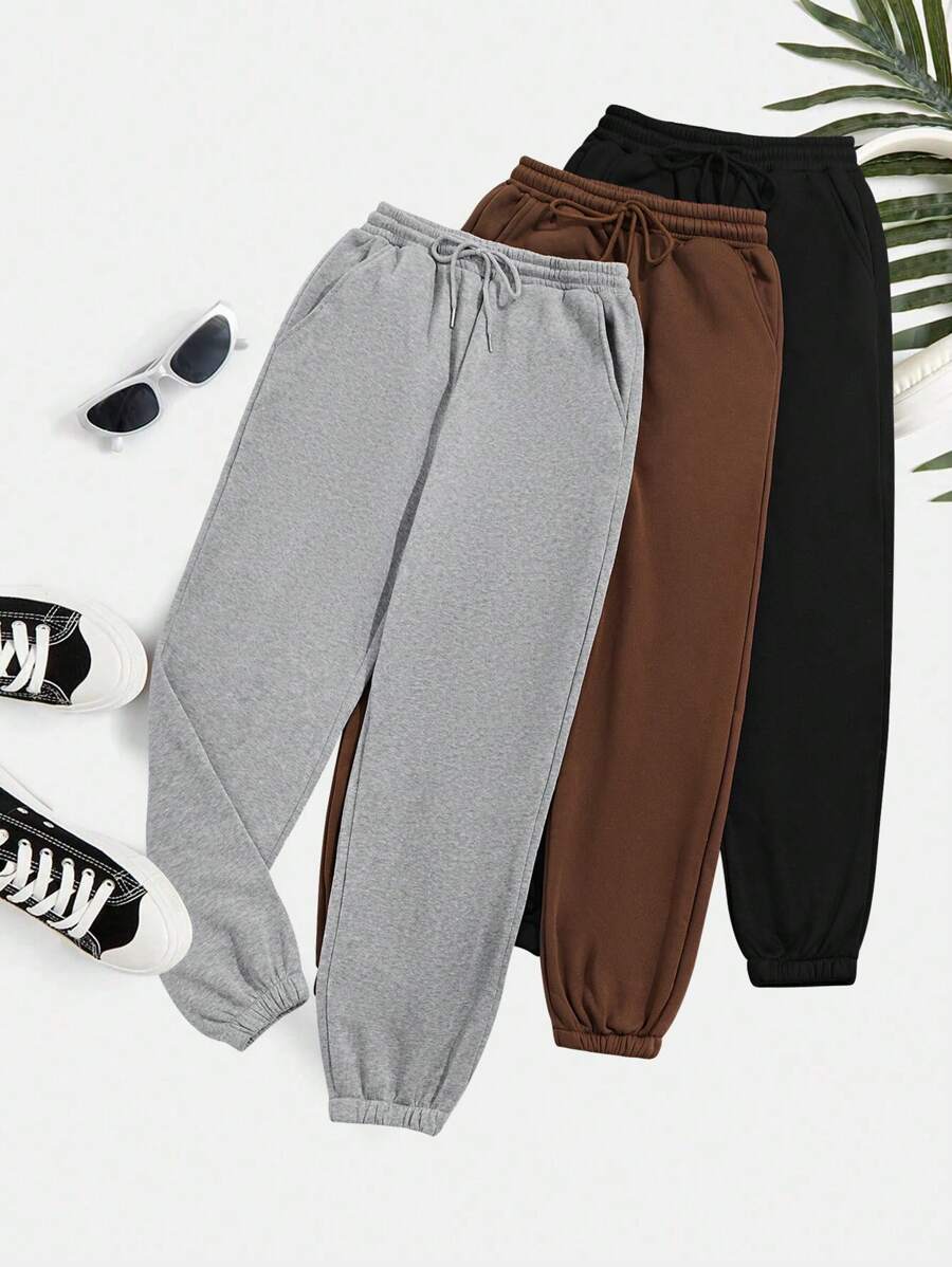 纯色保暖内衬运动裤三件套。舒适凉爽，活力无限的纯色保暖内衬运动裤三件套。三件套运动时尚套装适合秋冬季休闲运动、跑步、聚会和派对。简约三件套。 - 彩色 - 查看 1