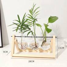 Bộ 3 bình hoa sáng tạo, khung gỗ và chất liệu kính, thích hợp cho cây trồng trong chậu, cây xanh và các loại cây thủy canh khác. Có thể sử dụng cho văn phòng, phòng khách, phòng ngủ, bàn làm việc, bàn ăn và các không gian trang trí nhà cửa khác. Cũng có thể dùng làm bình hoa, vật trang trí hoặc vật trang trí trung tâm. Trang trí bàn làm việc theo phong cách thủy canh cổ điển, thích hợp cho vườn nhà, trang trí văn phòng, trang trí phòng. Cũng có thể dùng làm quà tặng Ngày của Mẹ, quà sinh nhật hoặc quà tốt nghiệp. - Nhiều màu - Xem 15