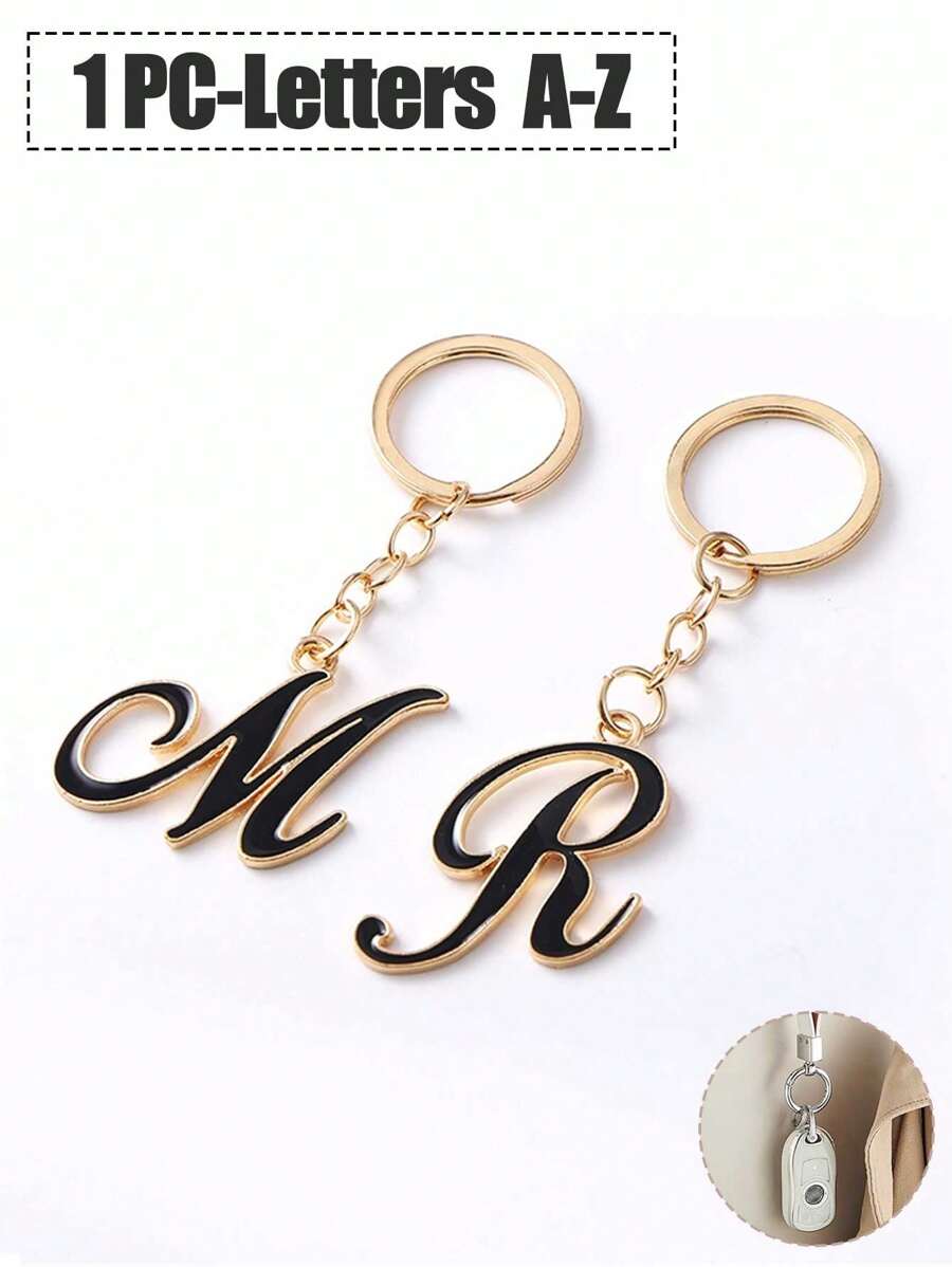 A-Z字母不对称金色钥匙扣，简约设计，高品质，适合作为包包配饰，是送给朋友或母亲的理想礼物，也适合挂在车上、车内或作为女士钥匙扣、包包挂件，是圣诞节或感恩节的完美礼物之选。 - 彩色 - 查看 1