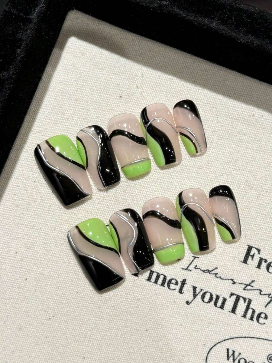 Bộ 10 miếng dán móng nghệ thuật hình thang ngắn với họa tiết đường kẻ hình học tối giản màu xanh neon và vàng, đồ trang trí móng tay thủ công chất lượng cao để sử dụng hàng ngày