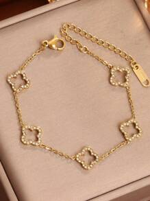 1 chiếc vòng tay bằng thép không gỉ mới thời trang độc đáo hình hoa bốn lá rỗng pha lê hình cỏ ba lá cho phụ nữ, phong cách hợp thời trang Châu Âu và Mỹ - Vòng tay hoa bốn lá rỗng đầy kim cương - Xem 9