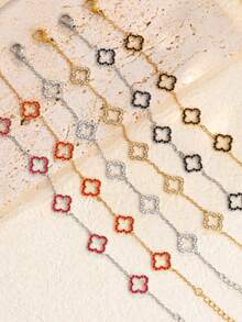 1 chiếc vòng tay bằng thép không gỉ mới thời trang độc đáo hình hoa bốn lá rỗng pha lê hình cỏ ba lá cho phụ nữ, phong cách hợp thời trang Châu Âu và Mỹ - Vòng tay hoa bốn lá rỗng đầy kim cương - Xem 1