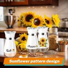kumlioon Juego de salero y pimentero, salero y pimentero con forma de girasol con soportes para el mango - Decoración moderna de cocina de vidrio - Juego de salero y pimentero para el hogar, restaurante, boda - Accesorios de cocina lindos y elegantes, saleros, pimenteros, saleros y pimenteros de vidrio con base estable para utensilios de cocina, mesa, caravana, camping, barbacoa, botella rociadora, suministros de cocina